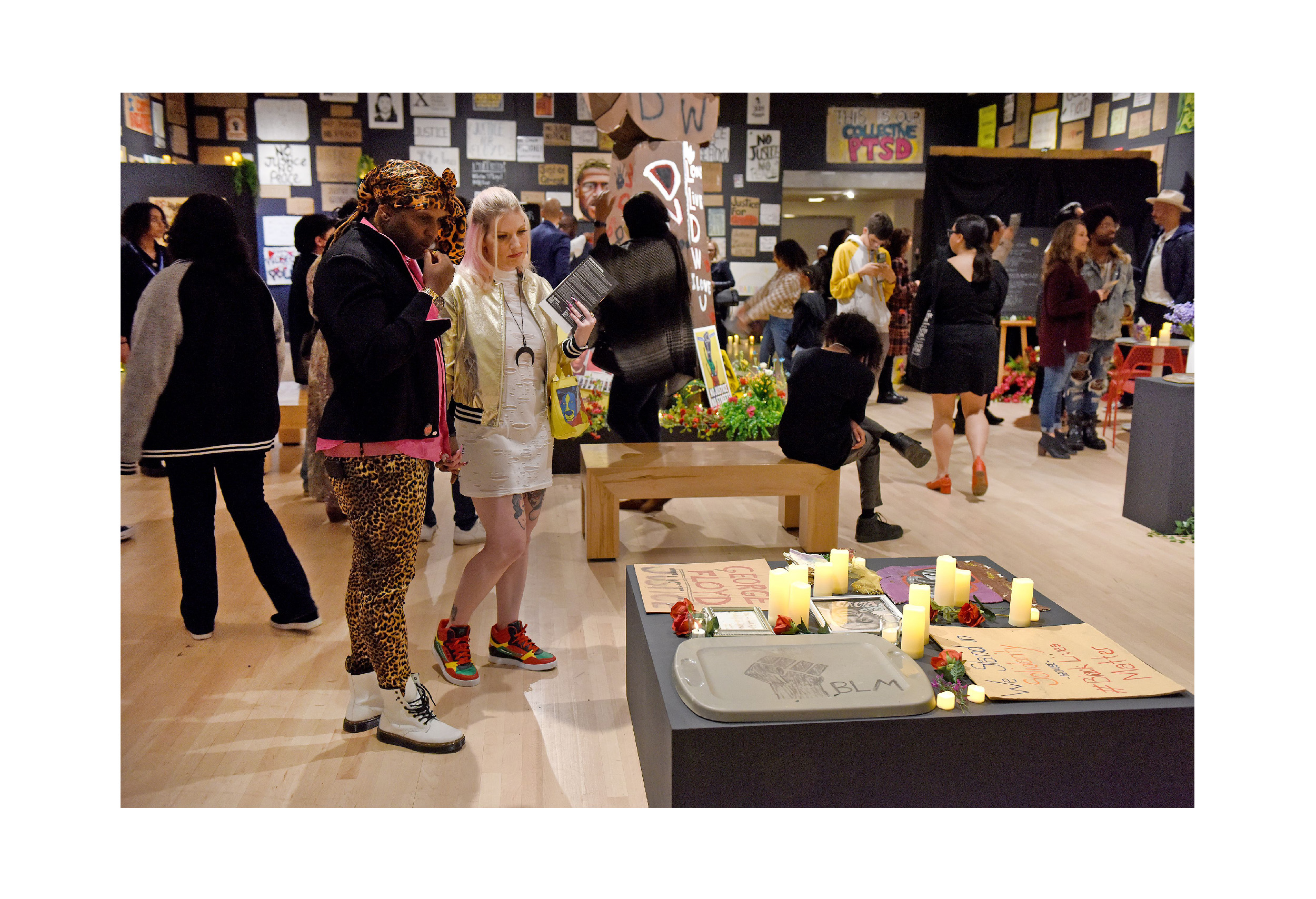 Visitors at the ASU Art Museum take in the "Twin Flames" exhibition.