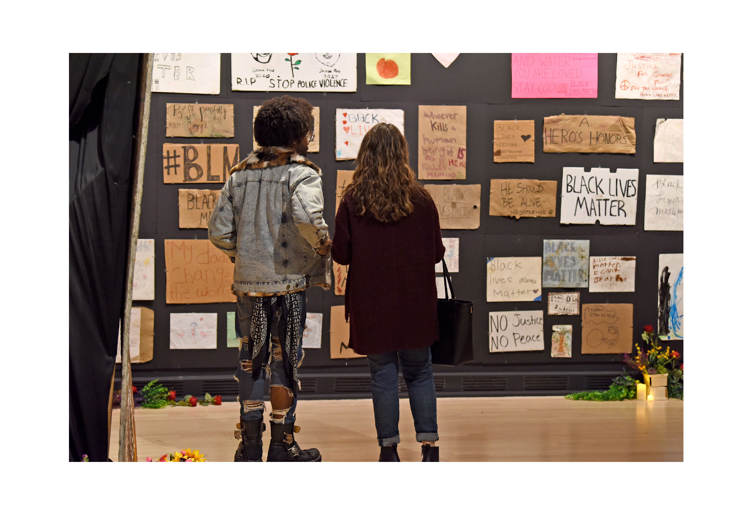 Visitors at the ASU Art Museum take in the "Twin Flames" exhibition.